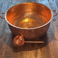 Omica Mosaic Copper Foot with Copper Ladle on a wooden surface